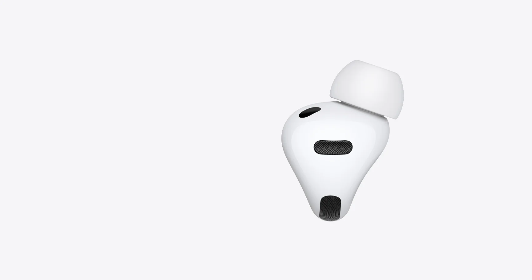 フォーム材入りの新しいイヤーチップとAirPods Pro 3のイヤホン本体を写したApple公式の画像
